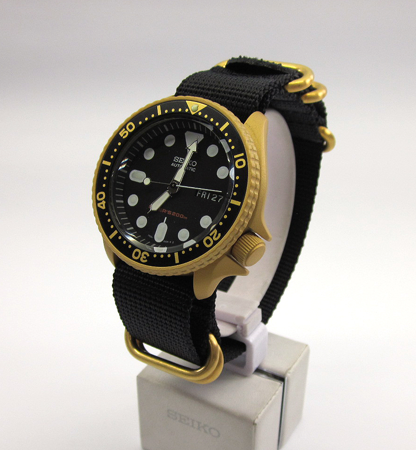 available now Seiko mod 7S26 skx007 GOLD Cerakote black dial zulu strap  with gold pvd - Mad Mod World
